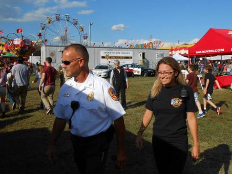 Assistant Chief A. Ruslander and Emt H. Newman working the Charles County Fair
